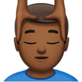 Apple(iPhone) Man Getting Massage: Medium-Dark Skin Tone Emoji