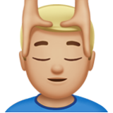 Apple(iPhone) Man Getting Massage: Medium-Light Skin Tone Emoji