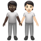 Apple(iPhone) People Holding Hands: Dark Skin Tone, Light Skin Tone Emoji