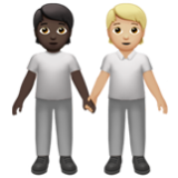 Apple(iPhone) People Holding Hands: Dark Skin Tone, Medium-Light Skin Tone Emoji