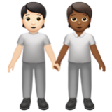 Apple(iPhone) People Holding Hands: Light Skin Tone, Medium-Dark Skin Tone Emoji