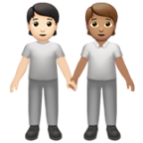 Apple(iPhone) People Holding Hands: Light Skin Tone, Medium Skin Tone Emoji