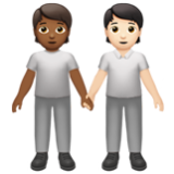 Apple(iPhone) People Holding Hands: Medium-Dark Skin Tone, Light Skin Tone Emoji