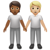 Apple(iPhone) People Holding Hands: Medium-Dark Skin Tone, Medium-Light Skin Tone Emoji