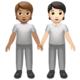 Apple(iPhone) People Holding Hands: Medium Skin Tone, Light Skin Tone Emoji