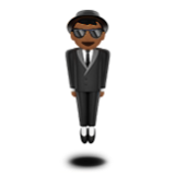 Apple(iPhone) Person In Suit Levitating: Medium-Dark Skin Tone Emoji