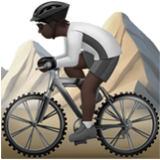 Apple(iPhone) Person Mountain Biking: Dark Skin Tone Emoji