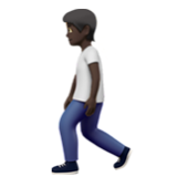 Apple(iPhone) Person Walking: Dark Skin Tone Emoji