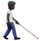 Apple(iPhone) Person With White Cane Facing Right: Dark Skin Tone Emoji