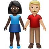 Apple(iPhone) Woman And Man Holding Hands: Dark Skin Tone, Medium-Light Skin Tone Emoji