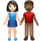 Apple(iPhone) Woman And Man Holding Hands: Light Skin Tone, Medium-Dark Skin Tone Emoji