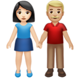 Apple(iPhone) Woman And Man Holding Hands: Light Skin Tone, Medium-Light Skin Tone Emoji