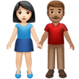 Apple(iPhone) Woman And Man Holding Hands: Light Skin Tone, Medium Skin Tone Emoji