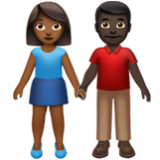 Apple(iPhone) Woman And Man Holding Hands: Medium-Dark Skin Tone, Dark Skin Tone Emoji