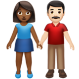 Apple(iPhone) Woman And Man Holding Hands: Medium-Dark Skin Tone, Light Skin Tone Emoji