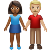 Apple(iPhone) Woman And Man Holding Hands: Medium-Dark Skin Tone, Medium-Light Skin Tone Emoji