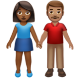 Apple(iPhone) Woman And Man Holding Hands: Medium-Dark Skin Tone, Medium Skin Tone Emoji