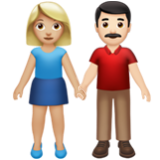 Apple(iPhone) Woman And Man Holding Hands: Medium-Light Skin Tone, Light Skin Tone Emoji