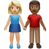 Apple(iPhone) Woman And Man Holding Hands: Medium-Light Skin Tone, Medium-Dark Skin Tone Emoji