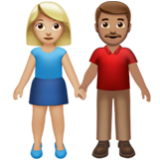 Apple(iPhone) Woman And Man Holding Hands: Medium-Light Skin Tone, Medium Skin Tone Emoji