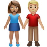 Apple(iPhone) Woman And Man Holding Hands: Medium Skin Tone, Medium-Light Skin Tone Emoji