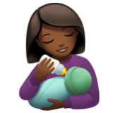 Apple(iPhone) Woman Feeding Baby: Medium-Dark Skin Tone Emoji