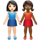 Apple(iPhone) Women Holding Hands: Light Skin Tone, Medium-Dark Skin Tone Emoji