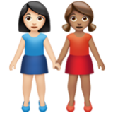 Apple(iPhone) Women Holding Hands: Light Skin Tone, Medium Skin Tone Emoji