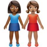 Apple(iPhone) Women Holding Hands: Medium-Dark Skin Tone, Medium Skin Tone Emoji