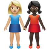 Apple(iPhone) Women Holding Hands: Medium-Light Skin Tone, Dark Skin Tone Emoji