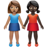 Apple(iPhone) Women Holding Hands: Medium Skin Tone, Dark Skin Tone Emoji