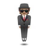 Google(Android) Person In Suit Levitating: Medium Skin Tone Emoji